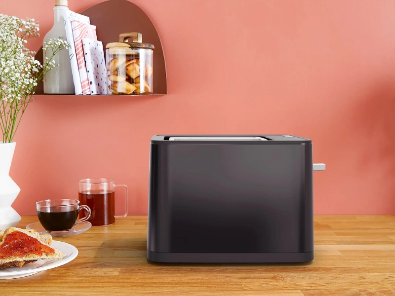 Hriankovač Tefal TT640810 vďaka variabiln&yacute;m otvorom každ&yacute; krajec vycentruje na stred.