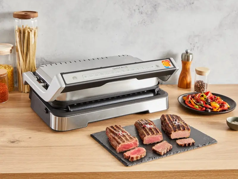 Technol&oacute;gia OptiGrill v grile Tefal GC782D30 OptiGrill zaruč&iacute; dokonal&eacute; v&yacute;sledky pečenia m&auml;sa.