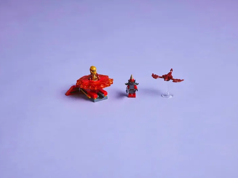 Stavebnica LEGO 71823 NINJAGO Kaiov dračí Spinjitzu spinner.